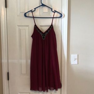 Burgundy mini dress with beads at the top